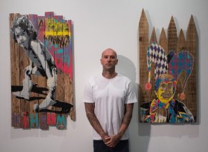 Artist Kleber Cianni standing with