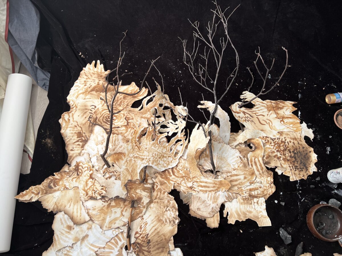2022_artist profile_SuziGarner_Burnt-Forest-1-work-in-progress-scorched-branches-and-scorched-breast-milk-painting-on-paper